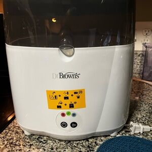 Never used dr. Brown bottle , pacifier sterilizer
